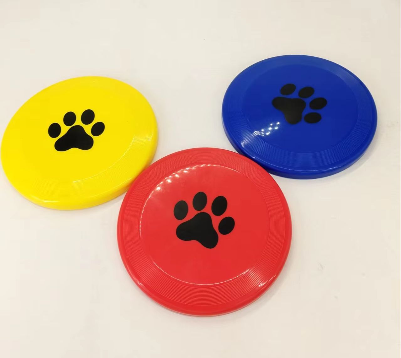 Flying Disc Dog Training Toy - จานร่อนสุนัขพลาสติกแข็ง ลายอุ้งเท้า กันลื่น ทรงแอโรไดนามิก บินได้เสถียร ของเล่นฝึกสุนัขกลางแจ้ง
